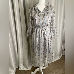 Beautiful OLISI floral dress size Medium silver/grey/blue